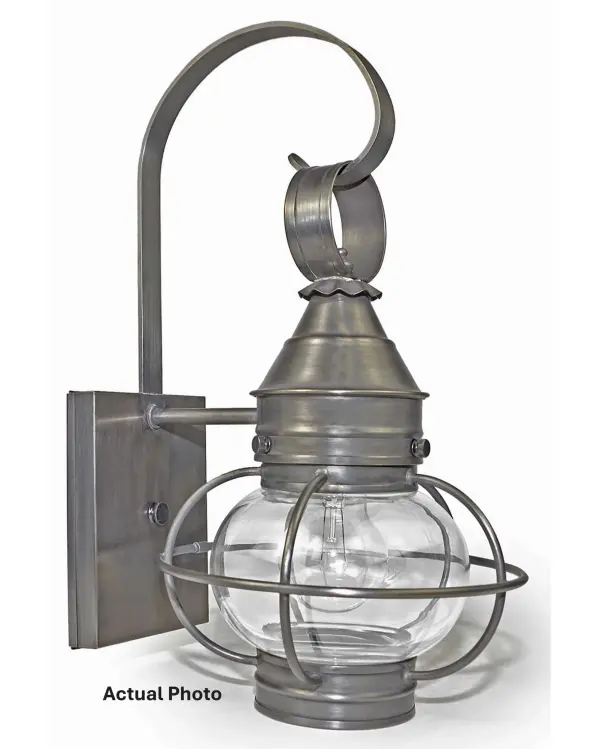 Evoking the classic lanterns from New England's rich nautical history, the Caged Onion collection features an iconic shape with a handcrafted brass or copper cage, protecting the hand-blown glass globe. Crafted with a detachable globe, they are easy - alternate view