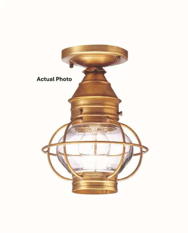 Evoking the classic lanterns from New England's rich nautical history, the Caged Onion collection features an iconic shape with a handcrafted brass or copper cage, protecting the hand-blown glass globe. Crafted with a detachable globe, they are easy