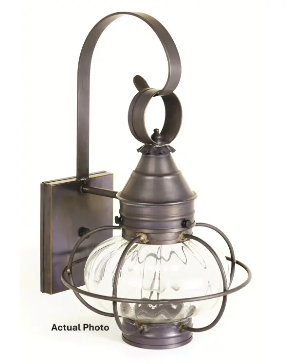 Evoking the classic lanterns from New England's rich nautical history, the Caged Onion collection features an iconic shape with a handcrafted brass or copper cage, protecting the hand-blown glass globe. Crafted with a detachable globe, they are easy