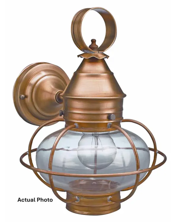 Evoking the classic lanterns from New England's rich nautical history, the Caged Onion collection features an iconic shape with a handcrafted brass or copper cage, protecting the hand-blown glass globe. Crafted with a detachable globe, they are easy to clean and maintain. The classic design makes them one of the most popular lights we make and is the inspiration for our company logo. Medium Caged Onion Wall Light Dimensions: 9"W x 11"D x 12.5"H Mounting height (From top to mounting bracket): 6" Bulb type: One 75-Watt Medium Base Bulb Suitable location: Wet Mounting Area: 5.25" Diam. Contact Dealer for Pricing & Availability Download Spec Sheet Note: Some photos are a digital rendering to show our finish, glass and socket options our actual finishes are hand-applied and our glass is hand-blown and will have natural variations from the photos.