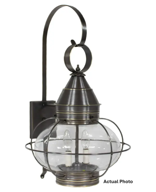 Evoking the classic lanterns from New England's rich nautical history, the Caged Onion collection features an iconic shape with a handcrafted brass or copper cage, protecting the hand-blown glass globe. Crafted with a detachable globe, they are easy