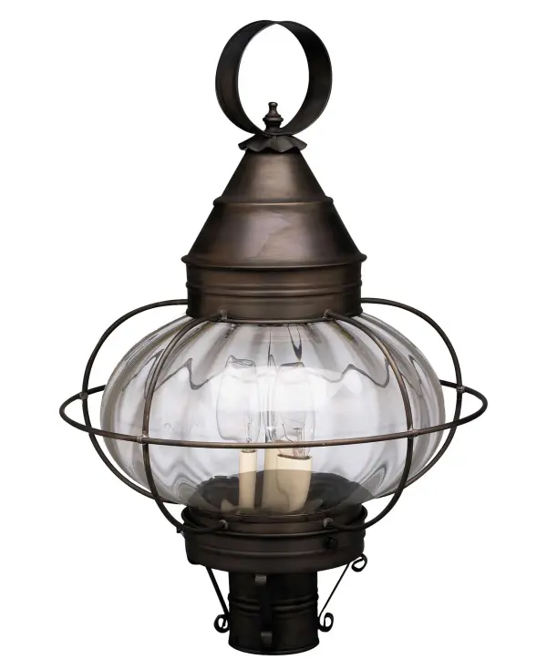 Evoking the classic lanterns from New England's rich nautical history, the Caged Onion collection features an iconic shape with a handcrafted brass or copper cage, protecting the hand-blown glass globe. Crafted with a detachable globe, they are easy