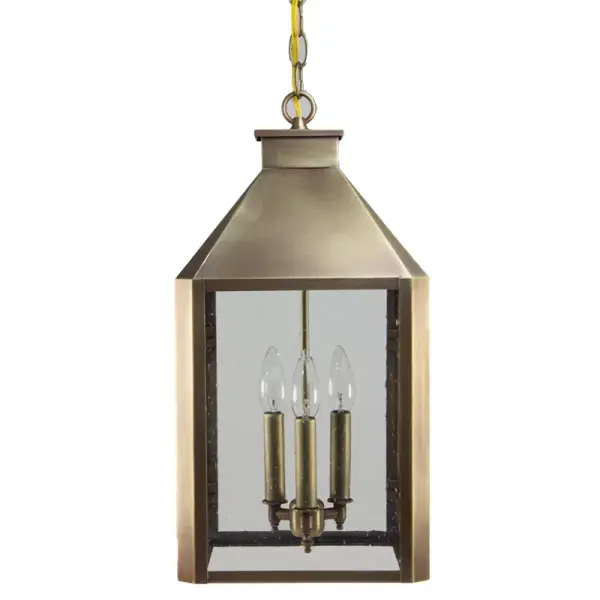 The Stonegate Collection is about strong, architectural style with a nod to history. Inspired by the classic lanterns that once lit the entrances of grand estates and gateways we added a fresh, modern twist. Its tall profile stands out, while the tapered base and pitched top keep the look balanced and refined. Ideal for framing front doors, highlighting covered porches, or brightening outdoor gathering areas, Stonegate offers light that blends heritage with clean lines and a minimalist design that feels right at home in contemporary spaces. Stonegate Hanging Light Dimensions: 10"W x 10"D x 19.5"H Mounting height (From top to mounting bracket): 36" Chain Bulb type: Three 60-Watt Candelabra Suitable location: Damp Mounting Area: 5" Diam. Contact Dealer for Pricing & Availability Download Spec Sheet Note: Some photos are a digital rendering to show our finish, glass and socket options our actual finishes are hand-applied and our glass is hand-blown and will have natural variations from the photos. - alternate view