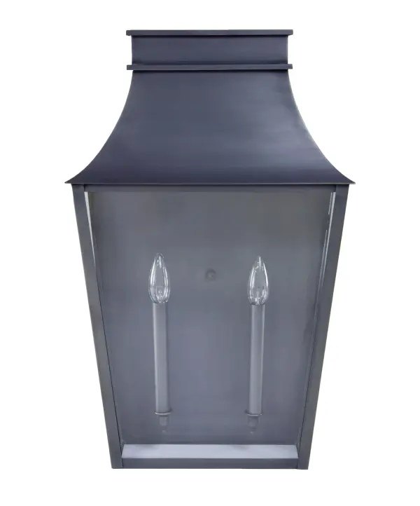Named after one of the most beautiful, historic towns on the seacoast of New Hampshire and where Northeast Lantern calls home. Inspired by the enduring elegance of historic architecture, this handcrafted lantern is a true testament to timeless design. It features a gracefully flared crown and tapered body that evokes the charm of traditional gas lamps once found along historic streets. Perfect for entryways, courtyards, or garden paths, it brings a refined sense of heritage and sophistication to any exterior setting. Exeter Large Wall Light Dimensions: 15"W x 7.5"D x 24"H Mounting height (From top to mounting bracket): 13.75" Bulb type: Two 60-Watt Candelabra Suitable location: Wet Mounting Area: 10"W x 14.5"H Contact Dealer for Pricing & Availability Download Spec Sheet Note: Some photos are a digital rendering to show our finish, glass and socket options our actual finishes are hand-applied and our glass is hand-blown and will have natural variations from the photos. - alternate view