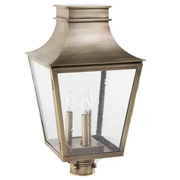 Named after one of the most beautiful, historic towns on the seacoast of New Hampshire and where Northeast Lantern calls home. Inspired by the enduring elegance of historic architecture, this handcrafted lantern is a true testament to timeless design. It features a gracefully flared crown and tapered body that evokes the charm of traditional gas lamps once found along historic streets. Perfect for entryways, courtyards, or garden paths, it brings a refined sense of heritage and sophistication to any exterior setting. Exeter Post Light Dimensions: 12"W x 12"D x 21.5"H Bulb type: Three 60-Watt Candelabra Suitable location: Wet Mounting Area: 3" Fitter Contact Dealer for Pricing & Availability Download Spec Sheet Note: Some photos are a digital rendering to show our finish, glass and socket options our actual finishes are hand-applied and our glass is hand-blown and will have natural variations from the photos.