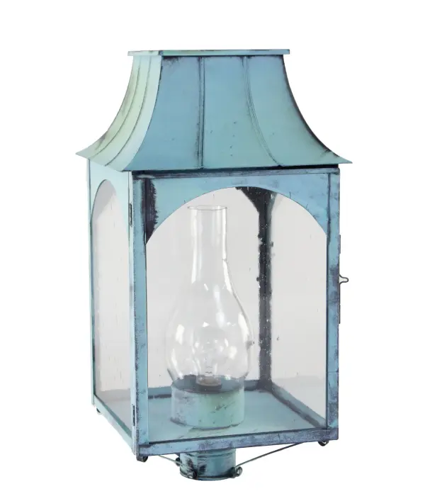 The Kensington collection reflects the character of its namesake town: quiet, crafted, and rooted in natural simplicity. Hand-formed in brass or copper, its flared roofline and clear glass chimney give the feel of a traditional lantern while delivering refined, durable construction. This piece brings the warmth of artisan workmanship to any exterior, with a silhouette inspired by the forests and small-town heritage of Kensington, NH. Kensington Post Light Dimensions: 12.5"W x 12.5"D x 23.5"H Bulb type: Three 60-Watt Candelabra or One 75-Watt Medium Base with Clear Chimney Suitable location: Wet Mounting Area: 3" Fitter Contact Dealer for Pricing & Availability Download Spec Sheet Note: Some photos are a digital rendering to show our finish, glass and socket options our actual finishes are hand-applied and our glass is hand-blown and will have natural variations from the photos.