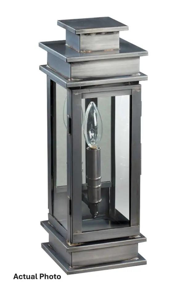 A fusion of streamlined contemporary style and traditional heritage, the Empire collection is highlighted by a double-tiered top with hard edges and flat sides. A unique design with two bulbs and an optional mirrored back panel for a sophisticated detail and reflecting more light. Perfect for indoor and outdoor use. Small Empire Wall Light Dimensions: 5.5"W x 5.75"D x 15.5"H Mounting height (From top to mounting bracket): 8.25" Bulb type: One 60-Watt Candelabra Socket Suitable location: Wet Mounting Area: 4"W x 9"H Contact Dealer for Pricing & Availability Download Spec Sheet Note: Some photos are a digital rendering to show our finish, glass and socket options our actual finishes are hand-applied and our glass is hand-blown and will have natural variations from the photos. - alternate view