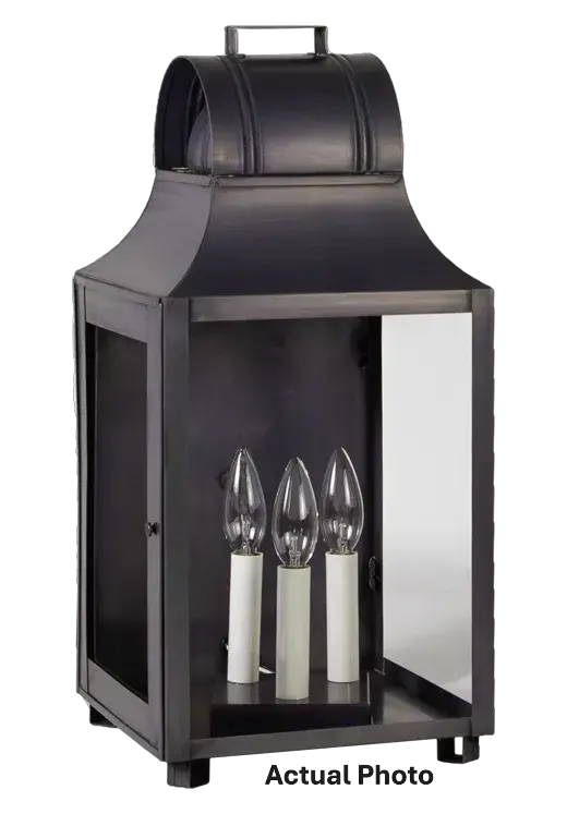 Rustic yet refined describes the Livery collection. Taking design elements from lanterns of times past, we incorporate a decorative handle or loop, feet, and optional reflectors to enhance the warm glow of your home. This collection is ideal for those lo - alternate view