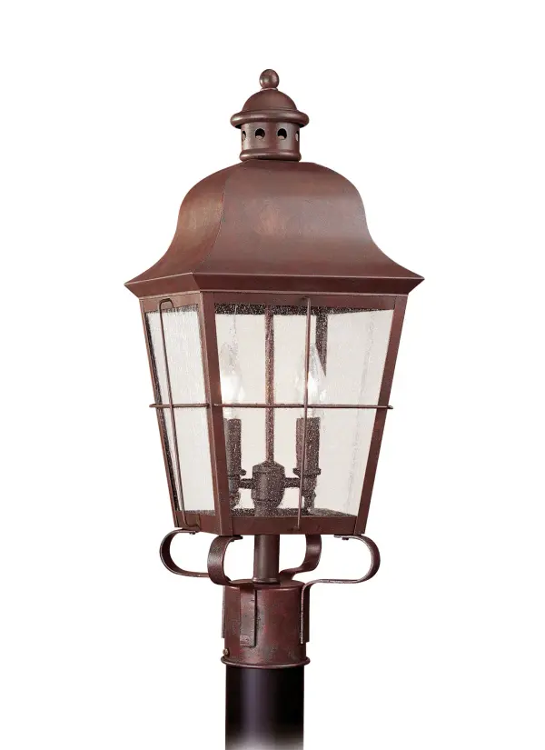The Chatham post lantern combines traditional maritime styling with modern LED efficiency. Its weathered copper finish and seeded glass create authentic coastal charm while providing reliable outdoor lighting.