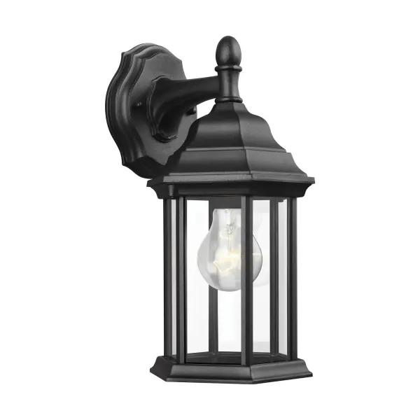 The Sevier wall lantern delivers reliable outdoor lighting in a compact 6.5" x 12.5" profile. Its die-cast aluminum construction and wet-rated certification ensure weather resistance, while clear glass and black finish suit various architectural styles.