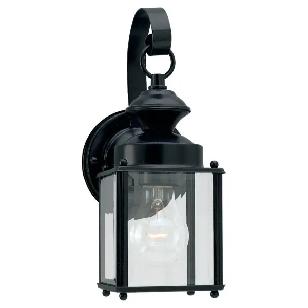 The Jamestowne wall lantern brings traditional charm to outdoor spaces with its compact design and clear beveled glass. Perfect for smaller entryways and porches where classic styling meets practical illumination.