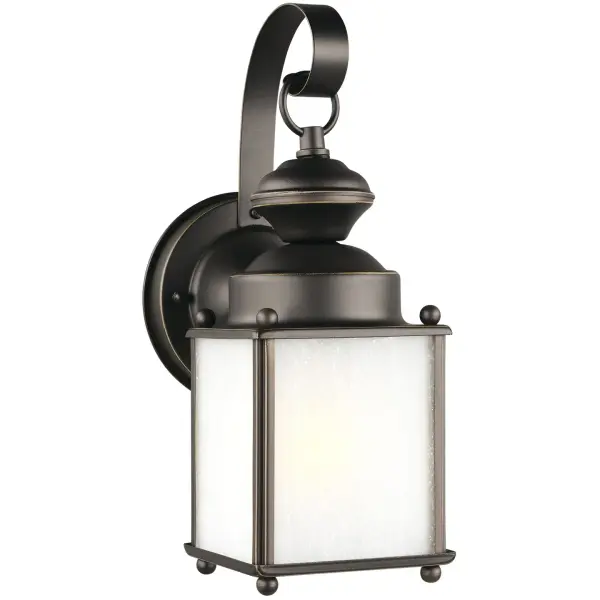 The Jamestowne wall lantern combines traditional styling with practical outdoor performance. Its compact 4-inch width and antique bronze finish suit various architectural styles, while wet-rated certification ensures reliable operation in exposed locations.