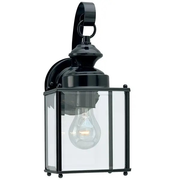 The Jamestowne wall lantern delivers traditional styling with clear beveled glass and durable black aluminum construction. Wet-rated for exposed outdoor locations, it provides reliable illumination for entryways and porches.