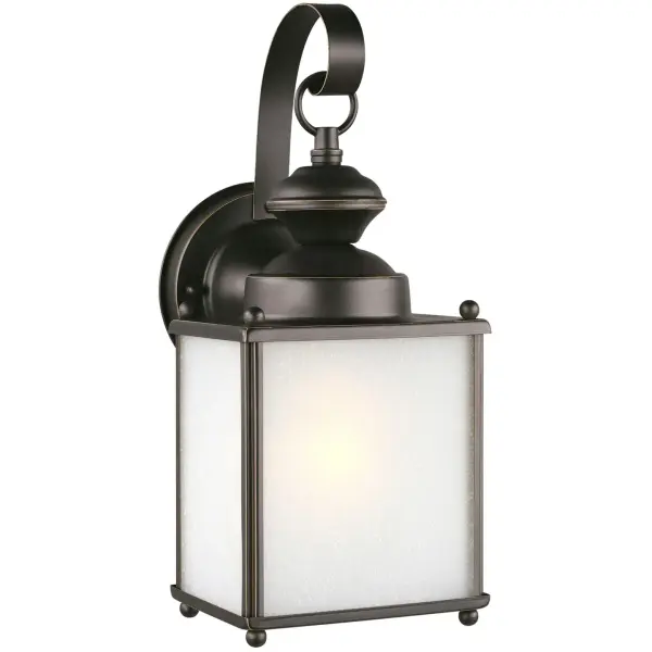 The Jamestowne wall lantern combines traditional styling with practical outdoor performance. Its compact 5.25" width and antique bronze finish suit various architectural styles, while wet-rated certification ensures reliable operation in exposed locations.