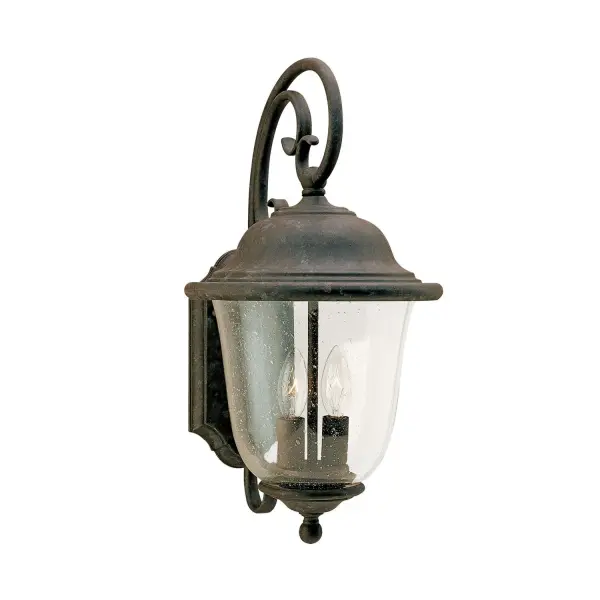 The Trafalgar wall lantern combines traditional styling with modern LED efficiency. Its oxidized bronze finish and seeded glass create timeless curb appeal, while wet-rated construction ensures reliable outdoor performance.