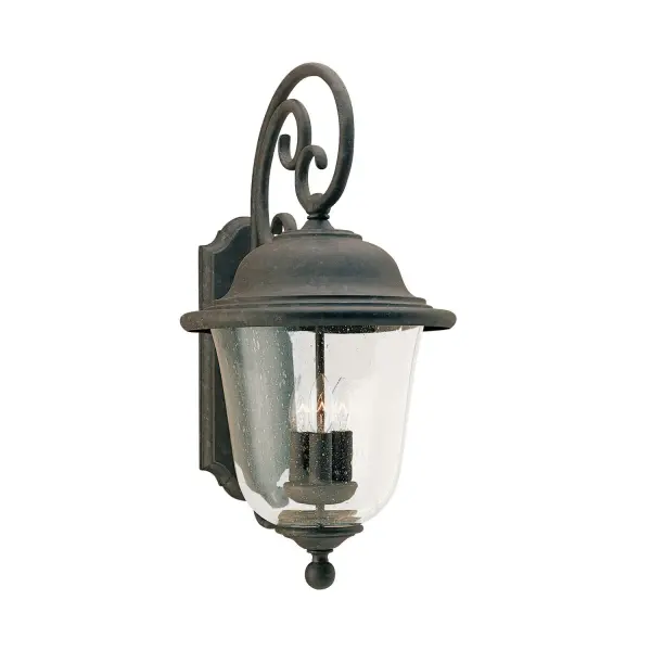 The Trafalgar wall lantern combines traditional styling with modern LED efficiency. Its oxidized bronze finish and seeded glass create timeless curb appeal, while wet-rated construction ensures reliable performance in any weather.