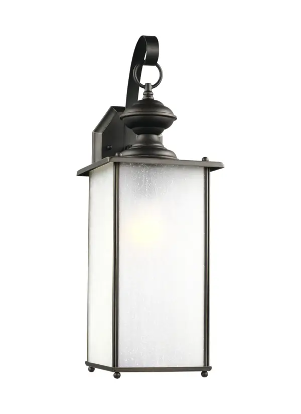 The Jamestowne wall lantern combines traditional styling with modern LED efficiency. Its compact 7-inch width and antique bronze finish make it ideal for smaller outdoor spaces while the wet-rated construction ensures durability.