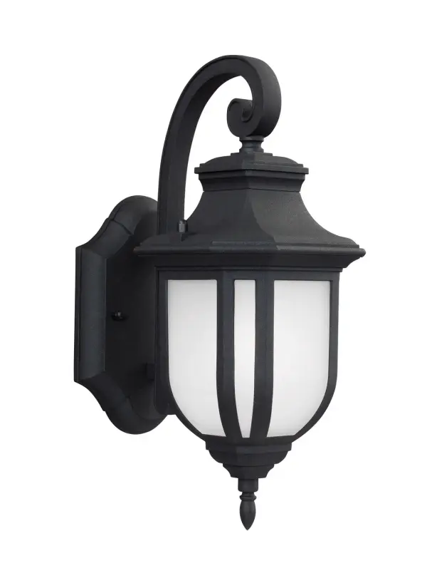 The Childress outdoor wall lantern combines a sleek black finish with satin etched glass for a clean, modern look. Its compact 5.5-inch width makes it ideal for smaller entryways and tight spaces while delivering 800 lumens of warm LED light.
