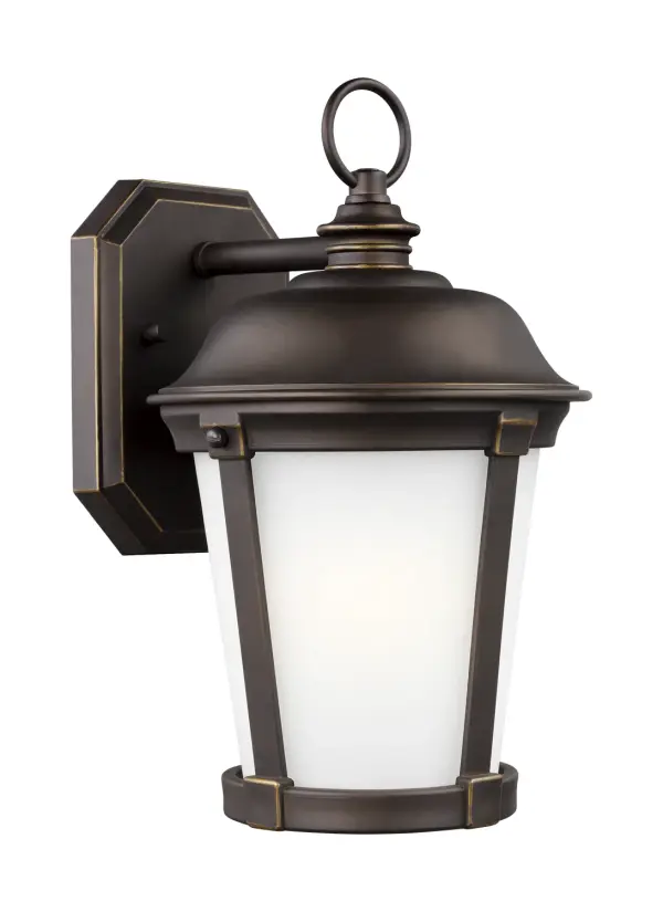 The Calder wall lantern combines traditional styling with modern durability. Its compact 7.88" width makes it ideal for smaller outdoor spaces, while the antique bronze finish and satin etched glass provide timeless appeal.