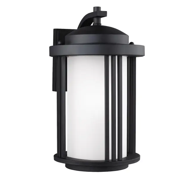 The Crowell wall lantern combines clean transitional styling with practical outdoor performance. Its compact 9-inch width and wet-rated construction make it ideal for entryways and porches where space is limited.