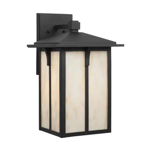 The Tomek outdoor wall lantern combines modern black aluminum construction with champagne-tinted glass for a sophisticated exterior lighting solution. Its wet-rated design and generous 12-inch extension make it ideal for covered porches and entryways.