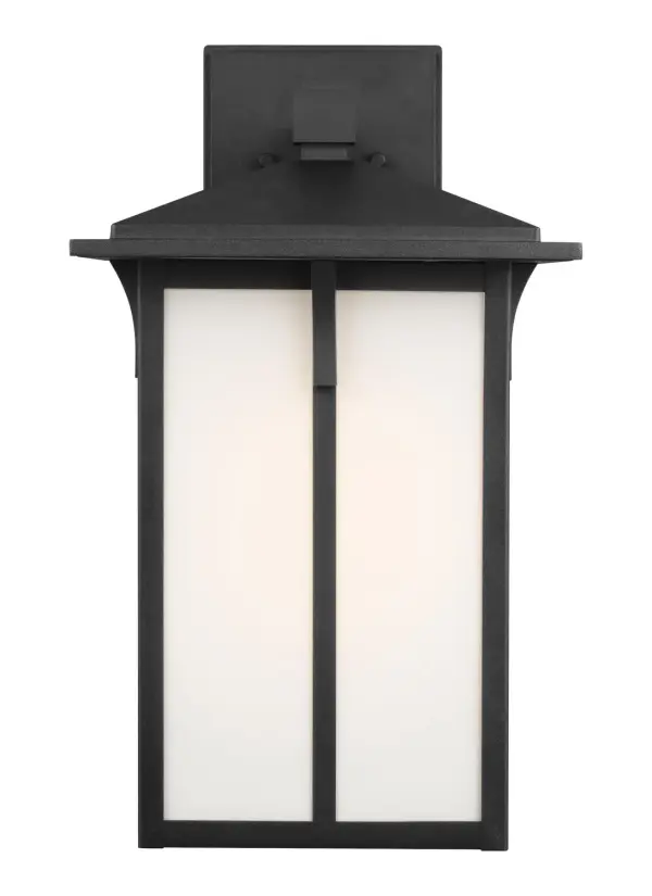 The Tomek wall lantern combines contemporary design with practical outdoor lighting. Its aluminum construction and wet-rated certification ensure durability in all weather conditions, while the integrated LED provides efficient, long-lasting illumination.