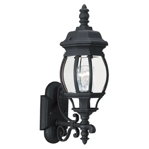 The Wynfield wall lantern delivers traditional styling with clear beveled glass and durable die-cast aluminum construction. Wet-rated for exposed outdoor locations, it provides reliable illumination for entryways and porches.