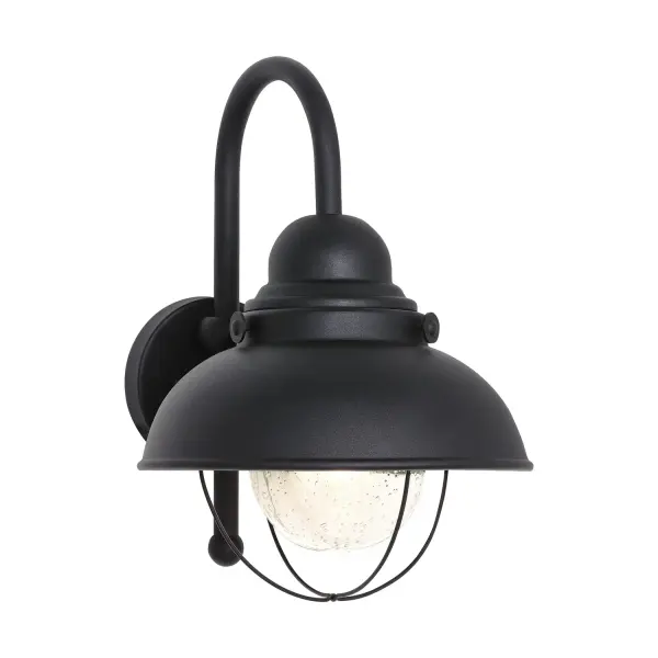 The Sebring wall lantern combines timeless design with contemporary LED technology. Its clear seeded glass and black aluminum construction deliver durability and style for any outdoor space.