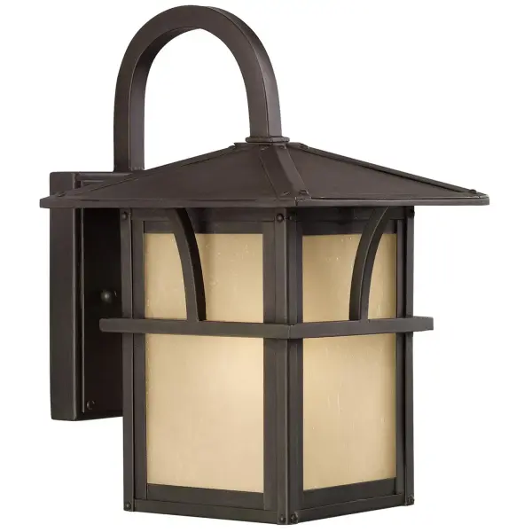 The Medford Lakes wall lantern combines classic design with modern LED efficiency. Its compact 7-inch width and wet-rated construction make it ideal for smaller outdoor spaces requiring reliable illumination.