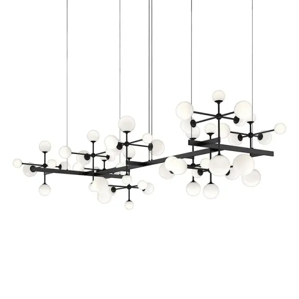 The Nebula Zig Zag transforms lighting into kinetic art with intersecting stems and illuminated glass spheres arranged in a dance-like rhythm. Its expansive 95.5-inch linear scale creates a commanding presence perfect for high-ceiling spaces.