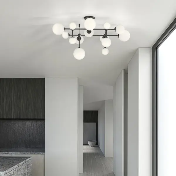 The Sabon Semi-Flush Mount features multiple etched glass globes arranged on intersecting stems at right angles, creating a striking geometric composition. High-quality LED technology with 90 CRI delivers warm, natural light.