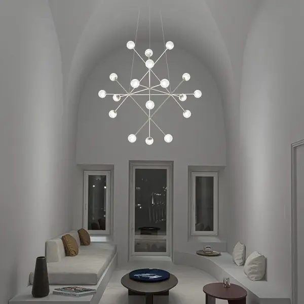 The Proton Beta Chandelier delivers dramatic visual impact with its contemporary design and sophisticated satin nickel finish. Perfect for modern dining rooms and grand entryways seeking a sculptural lighting centerpiece.