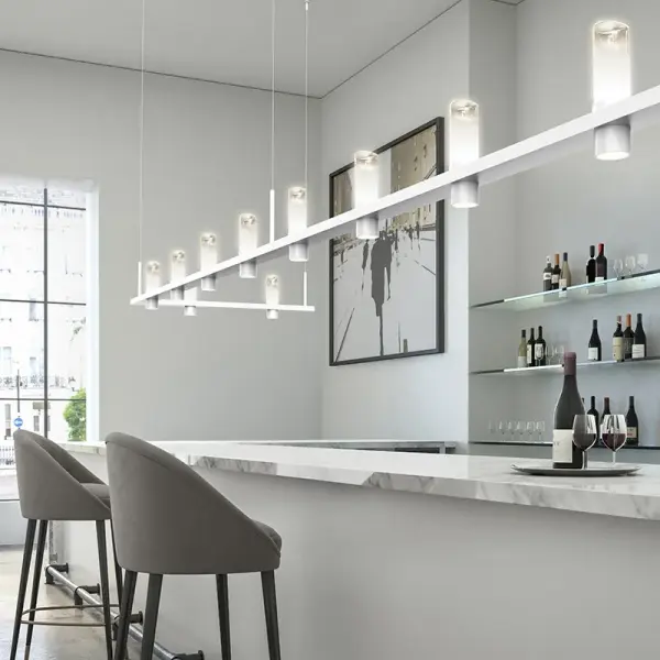 The INTERVALS Linear Beam Pendant delivers sophisticated architectural lighting with rhythmically aligned bidirectional illumination. Its 4-foot span and integrated LED system make it ideal for modern spaces requiring dramatic, functional lighting.