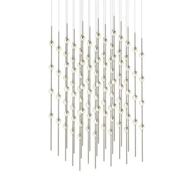 The Constellation pendant delivers museum-quality illumination with 100 integrated LED points creating a dramatic starfield effect. Its 20.5-inch linear profile and faceted acrylic diffusion make it ideal for modern dining spaces.