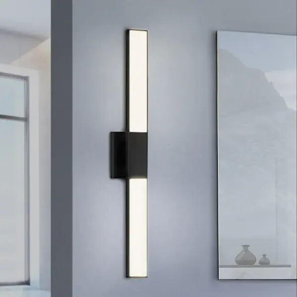 The Planes LED Double Sconce delivers modern minimalism with its geometric precision and advanced edge-lit LED panels. Offering 510 delivered lumens with excellent 90 CRI, this versatile fixture mounts vertically or horizontally.