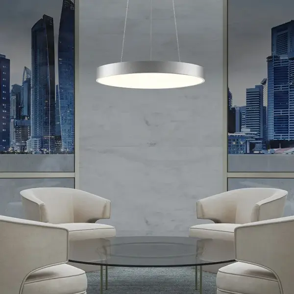 The Pi LED Pendant embodies architectural minimalism with its clean circular form and integrated LED technology. Available in multiple mounting options, this fixture delivers efficient, high-quality illumination.