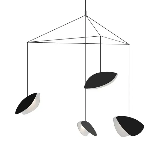 The Papillons pendant features a dramatic 53.5-inch wingspan with four integrated LED modules delivering warm, efficient illumination. Its satin black aluminum construction creates a bold statement while the butterfly-inspired form adds organic movement.