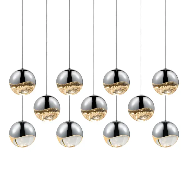 The Grapes pendant brings contemporary elegance with 11 integrated LED spheres suspended in a linear arrangement. Its polished chrome finish and clear glass create a sophisticated focal point perfect for modern dining and kitchen spaces.