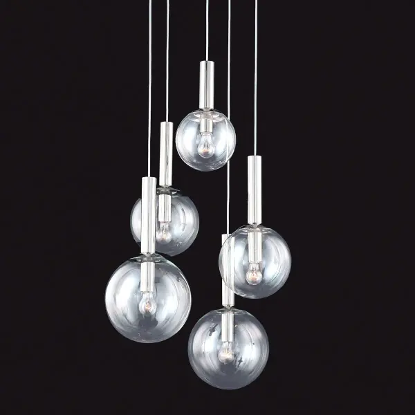 The Bubbles pendant brings contemporary elegance with five clear glass spheres suspended in polished nickel. Its clean lines and reflective finish work beautifully in modern and transitional spaces, offering both ambient and decorative lighting.