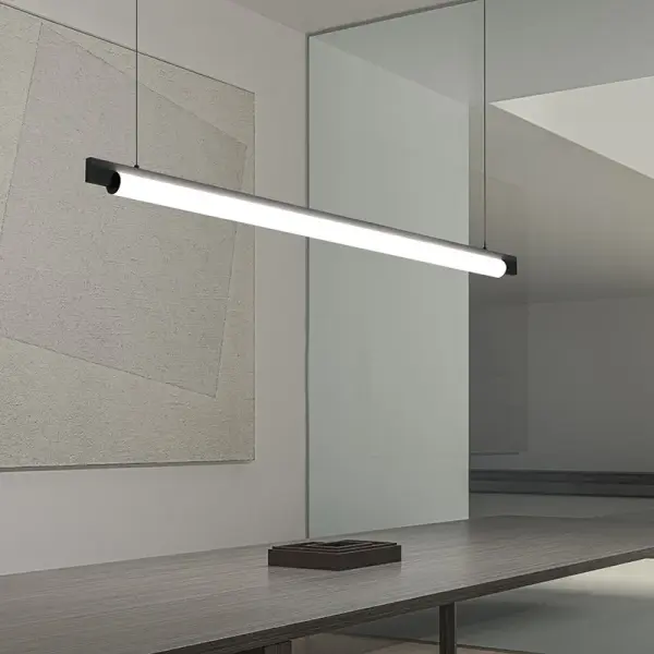 The Keel LED Pendant delivers architectural precision with its clean, linear form spanning 44 inches. Perfect for modern interiors seeking functional task lighting with minimal visual weight. High CRI and warm 3000K temperature.
