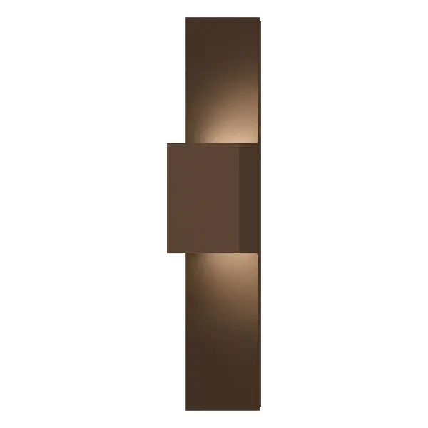 The Flat Box LED Wall Sconce combines minimalist design with high-performance LED technology. Its textured bronze aluminum construction and wet rating make it versatile for both interior and exterior applications.
