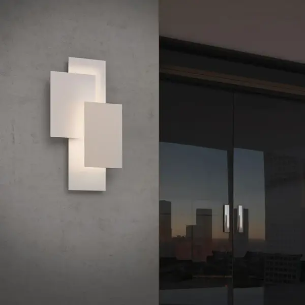 The Offset Panels LED Sconce combines contemporary geometric design with integrated LED technology in a polished nickel finish. Its offset panel configuration creates visual interest while providing efficient, modern illumination.