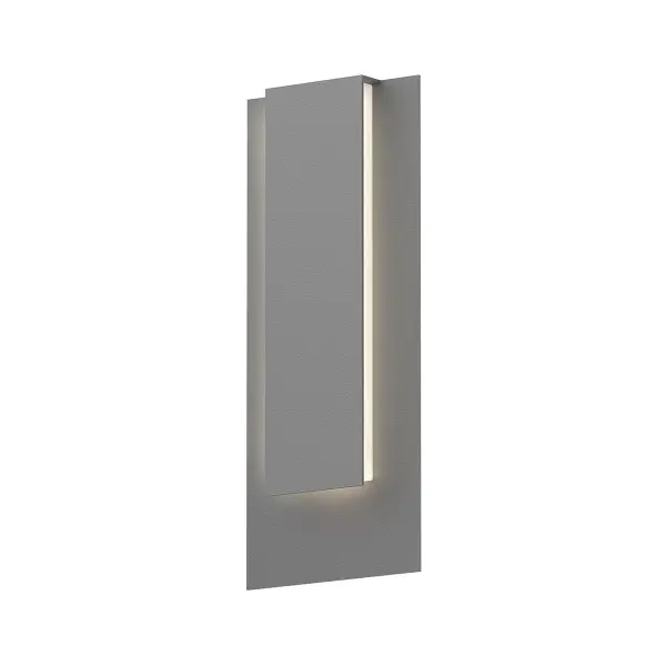 The Reveal LED Wall Sconce combines contemporary design with practical outdoor performance. Its textured gray aluminum construction and integrated LED technology deliver 1700 lumens of warm light while meeting ADA and wet location requirements.