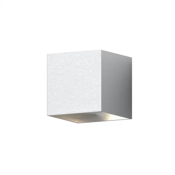 The Qube LED Wall Sconce delivers modern minimalism with its geometric aluminum form and integrated LED technology. Wet-rated for versatile placement, it provides efficient 750-lumen output with excellent color rendering.