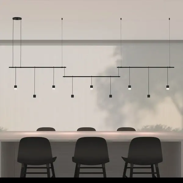 The Suspenders 36" combines etched glass diffused lighting with directional downlights in an offset 3-bar configuration. This architectural system delivers balanced illumination perfect for surface-dominated spaces requiring both ambient and focused light.