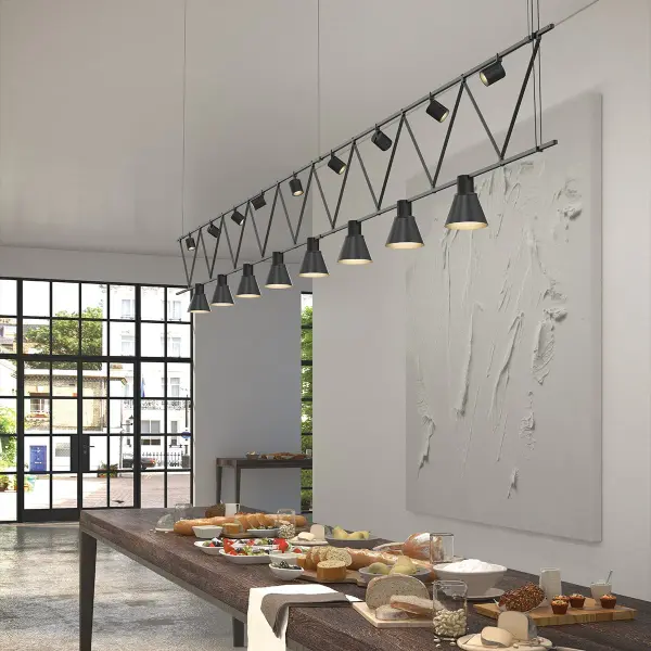 The Suspenders 14' Flat Truss transforms spaces with its dramatic industrial aesthetic and exceptional versatility. Featuring direct-mount and aimable cylinder fixtures on a 170-inch span, this system delivers both architectural impact and functional lighting control for large residential and commercial interiors.