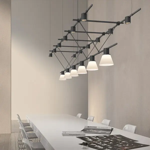 This 96-inch triangle truss configuration delivers both precise task lighting from direct-mount cylinders and softer ambient light from etched glass cones, making it ideal for large dining tables or expansive commercial spaces.