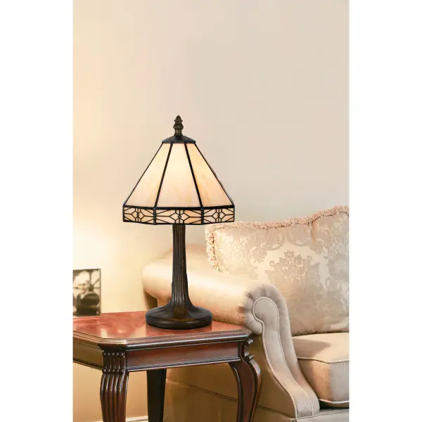 This charming accent lamp features authentic Tiffany-style stained glass with 16 individual glass pieces and a durable zinc cast base in antique brass. Perfect for adding warm, ambient lighting to intimate spaces. - alternate view