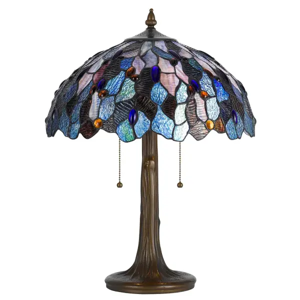 This traditional table lamp showcases authentic Tiffany-style design with 248 pieces of handcrafted stained glass. The durable zinc cast base in antique brass finish provides stability while the double socket offers flexible lighting options.
