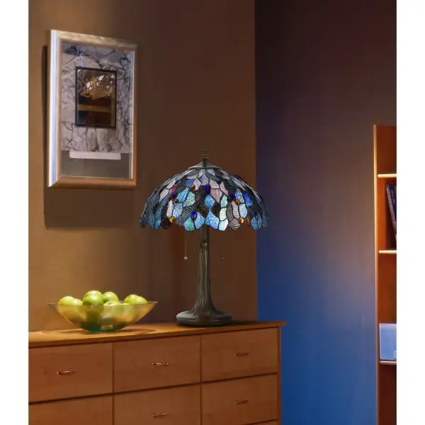 This traditional table lamp showcases authentic Tiffany-style design with 248 pieces of handcrafted stained glass. The durable zinc cast base in antique brass finish provides stability while the double socket offers flexible lighting options. - alternate view
